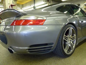 The back of a silver 2001 Porsche 911 turbo