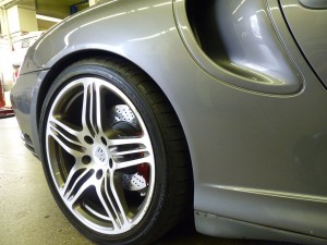 A close up of the wheel on a car