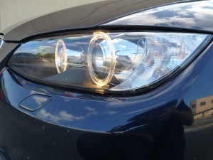 A close up of the headlight on a car