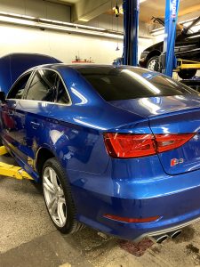 The back of a blue Audi S3